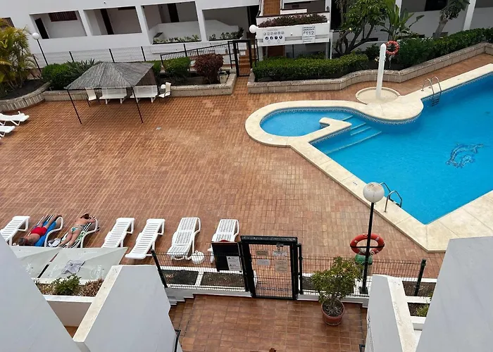 Апартаменты La Casita De La Piscina