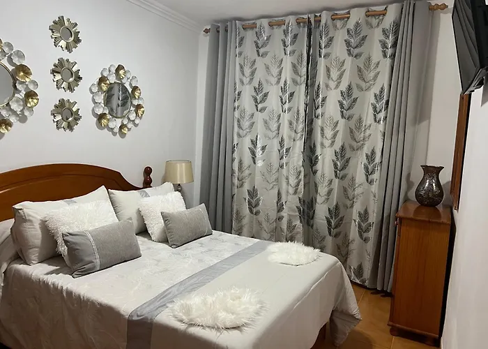 Апартаменты La Casita De La Piscina *